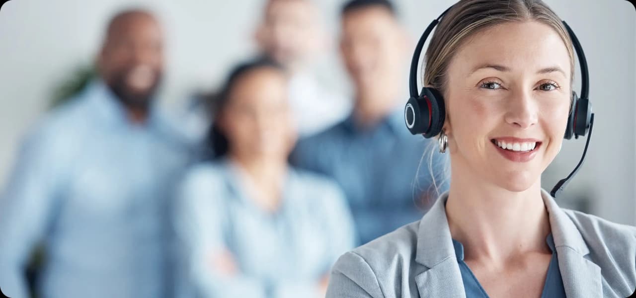 Qualityze support team member on a headset call